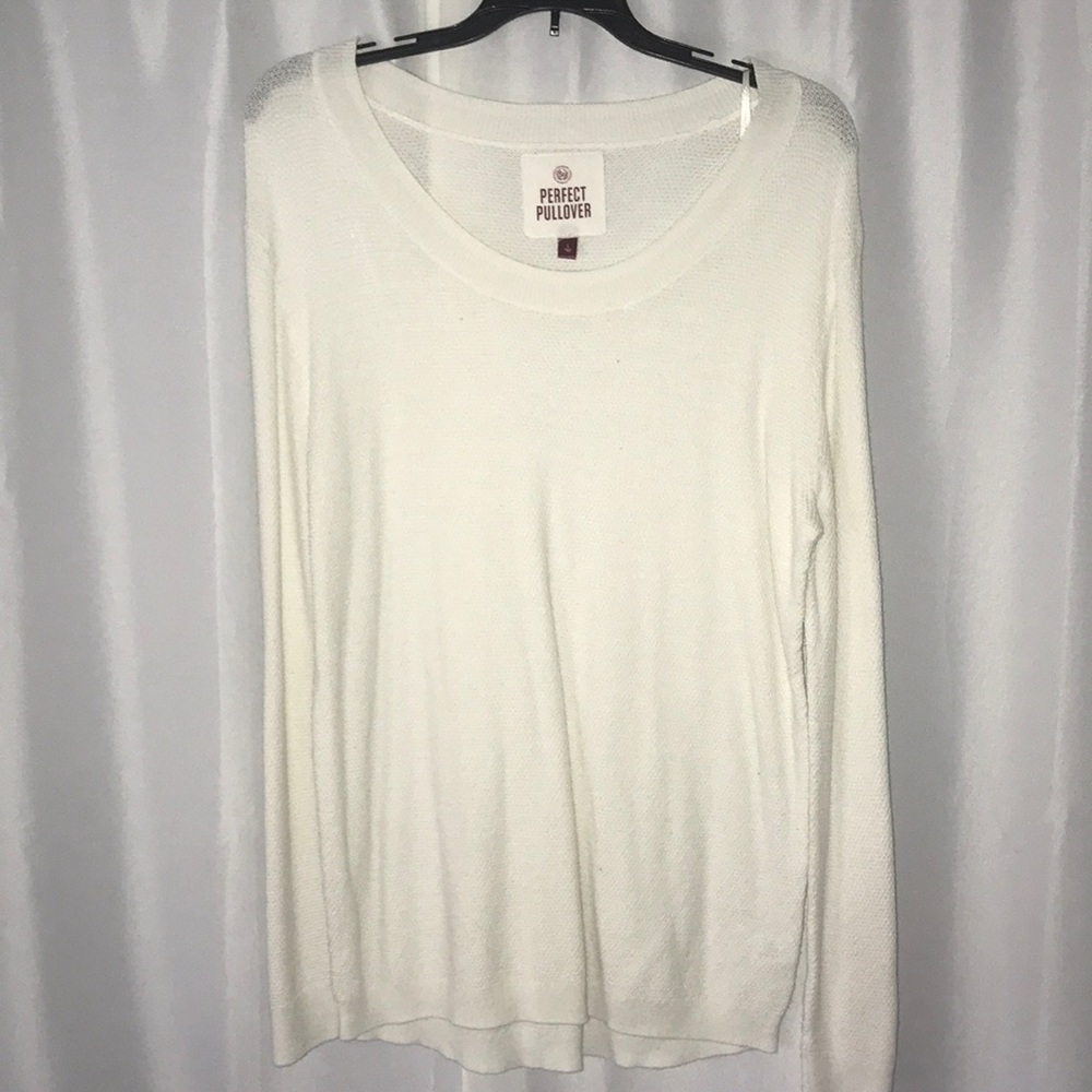 lightly worn sweater